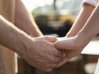 Close Up People Holding Hands